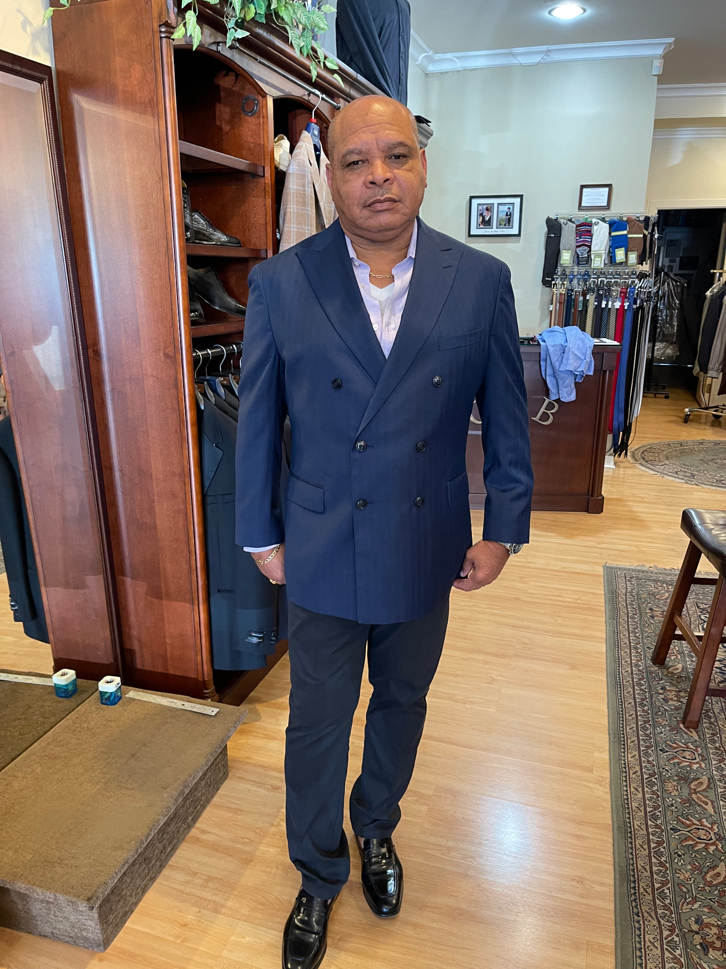 Father of the bride in a navy double-breasted bespoke suit