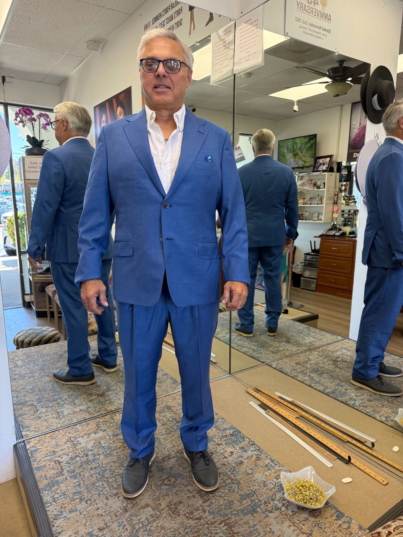 Groomsman in a vibrant blue bespoke suit
